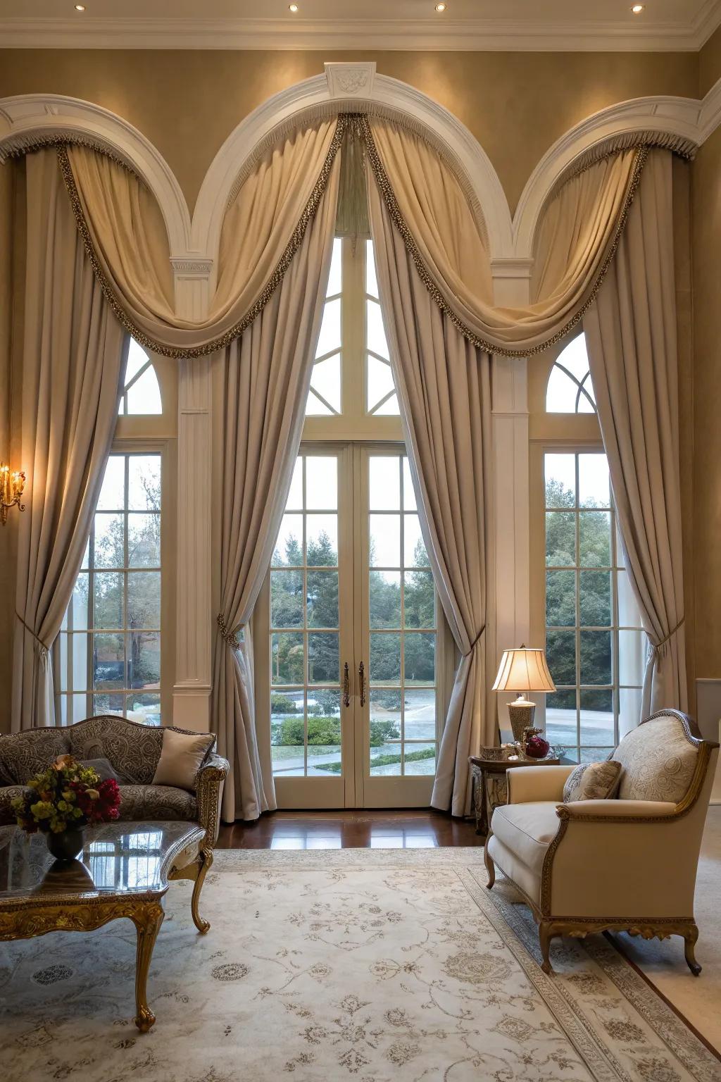 Elegant living room featuring fabric panels that frame arched windows.