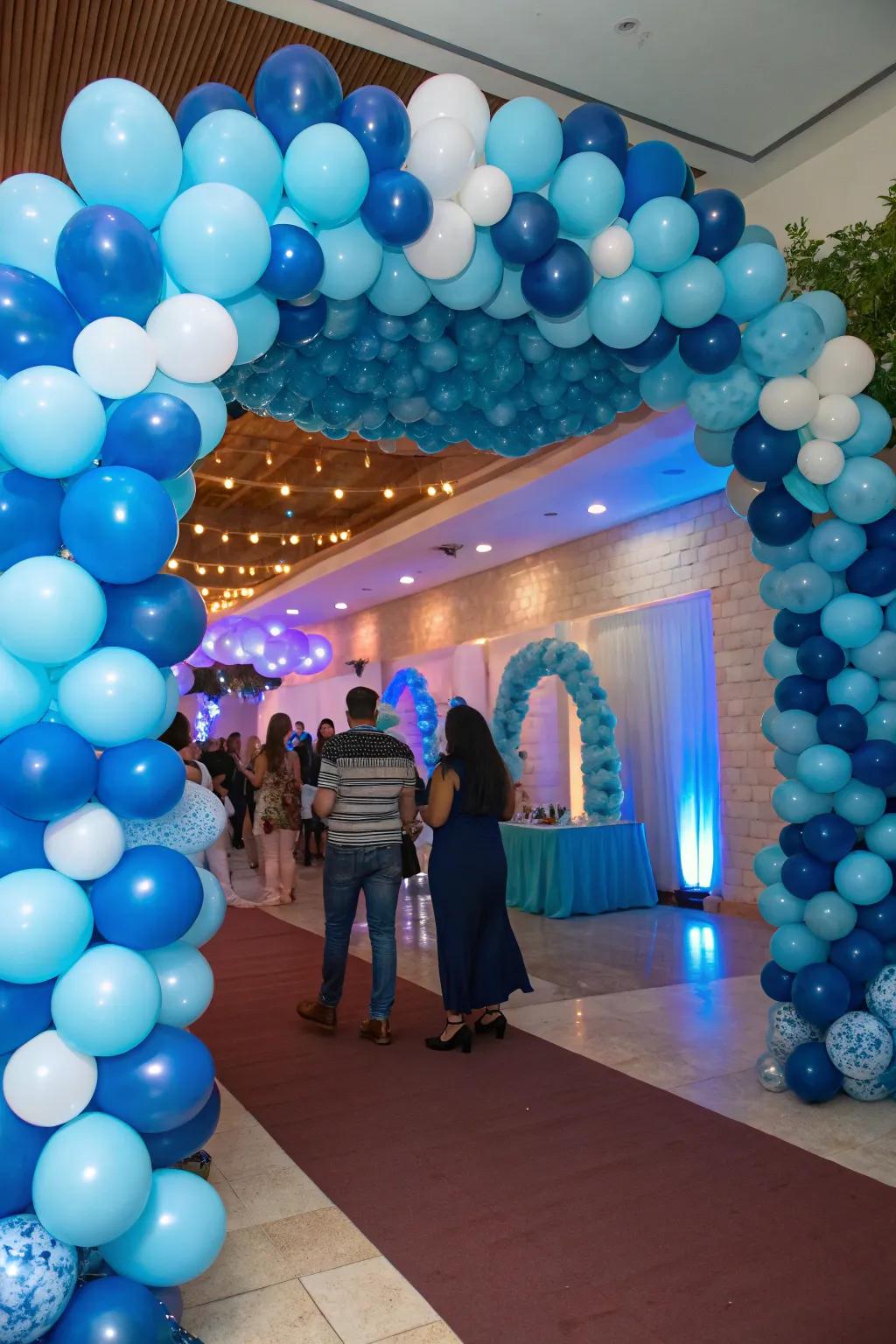 An eye-catching blue balloon arch establishing a magical party ambiance.