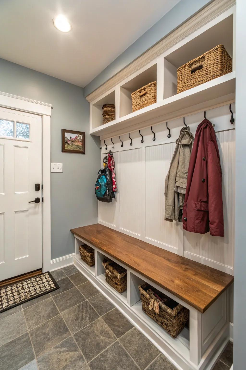 A narrow nook tastefully converted into an efficient mudroom.