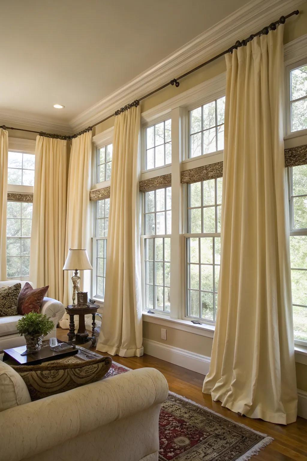 Matching curtains bring a sense of unity and elegance to a room with multiple windows.