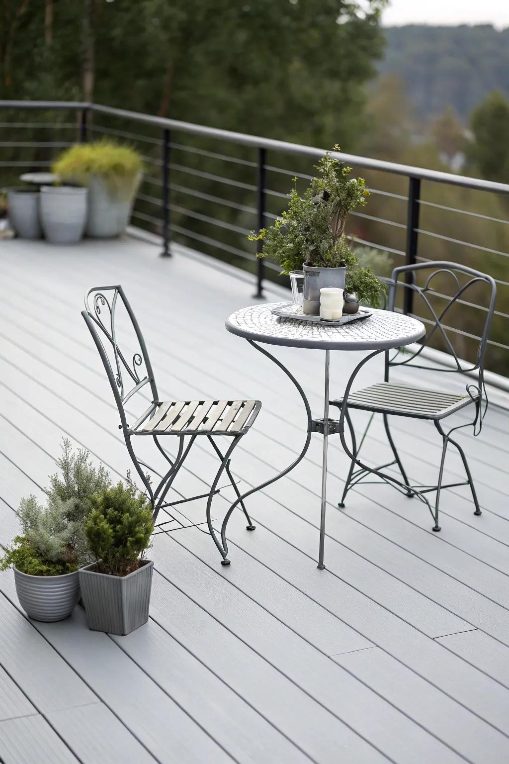 A minimalist grey deck featuring sleek furniture for a modern aesthetic.