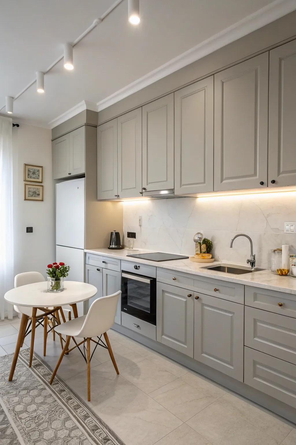 A minimalist grey kitchen embodies simplicity and peace.