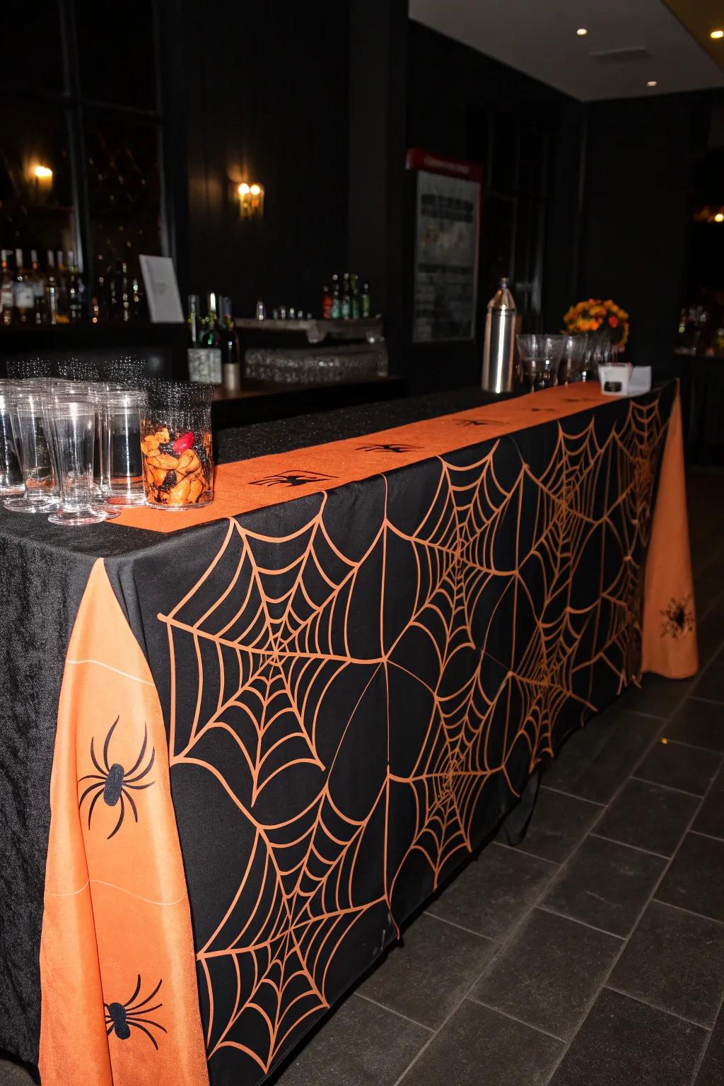 Establish the ambiance through thematic linens and spectral decorations.