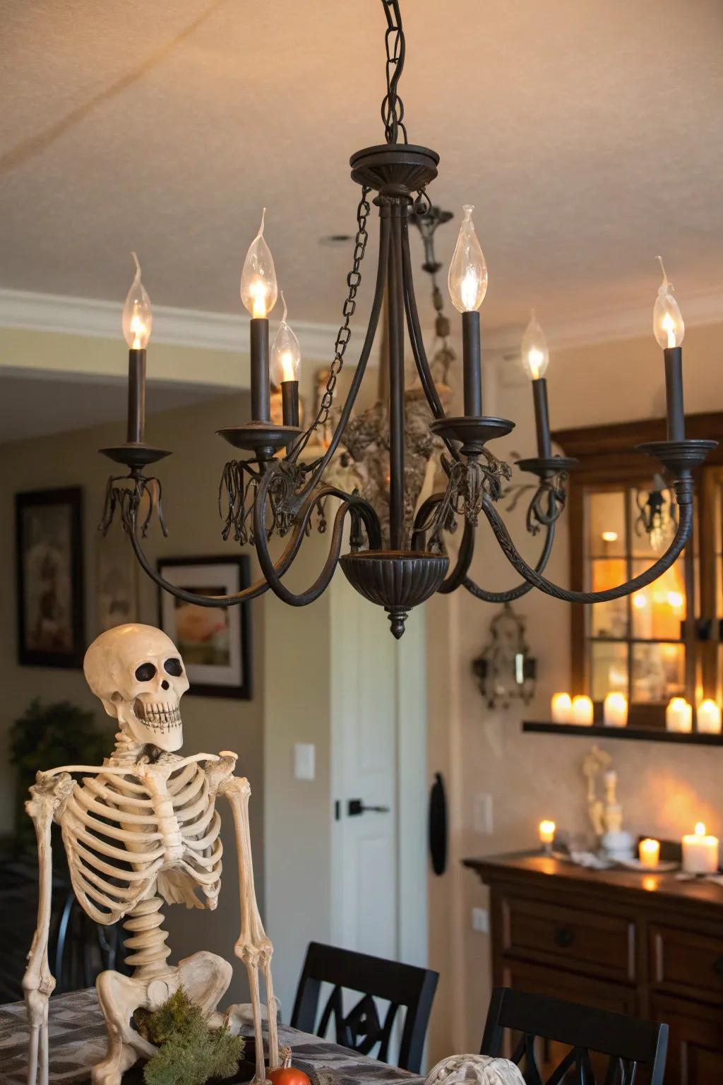 A skeleton gives the chandelier a spooky makeover.