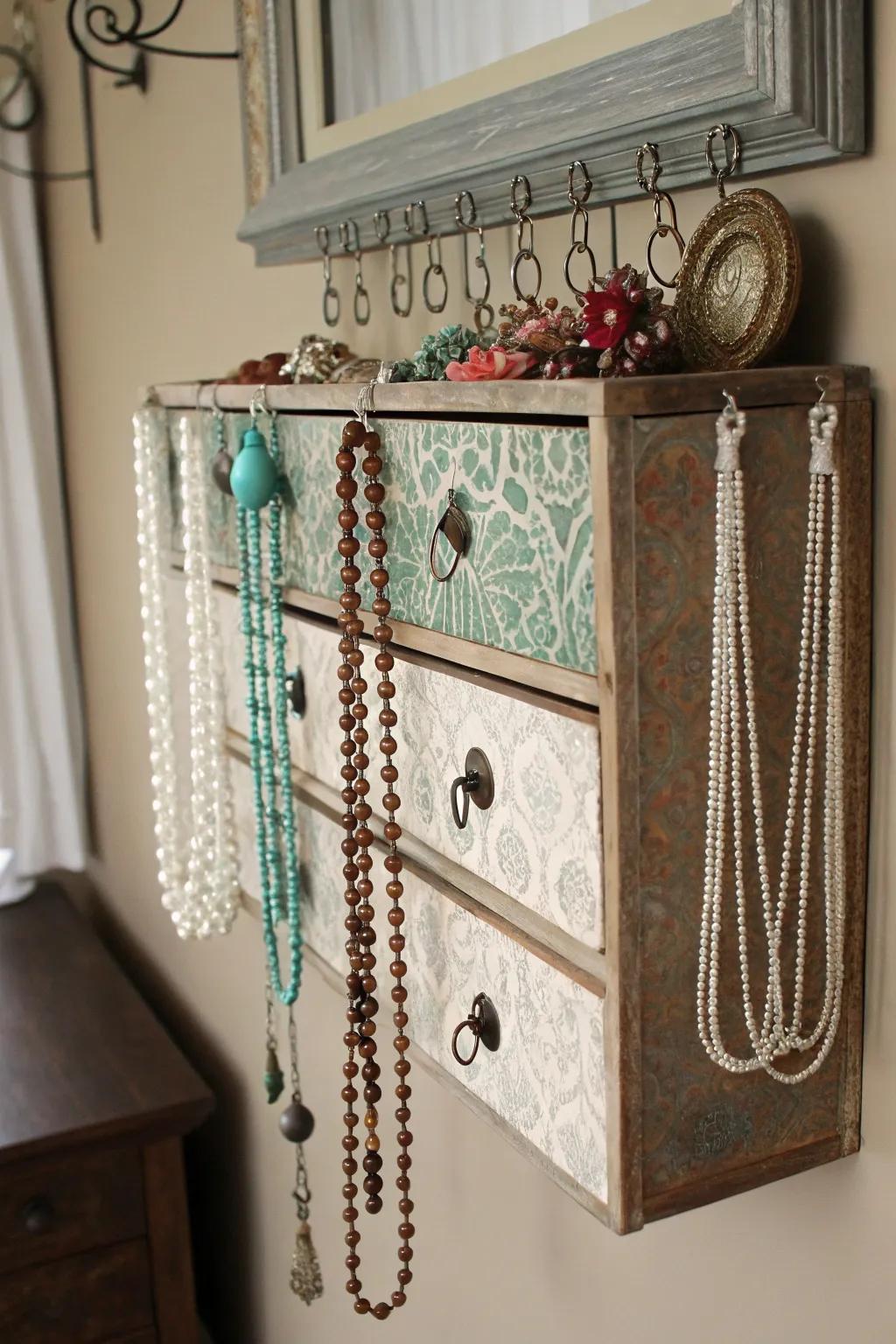 A repurposed vintage drawer transformed into a stylish necklace display