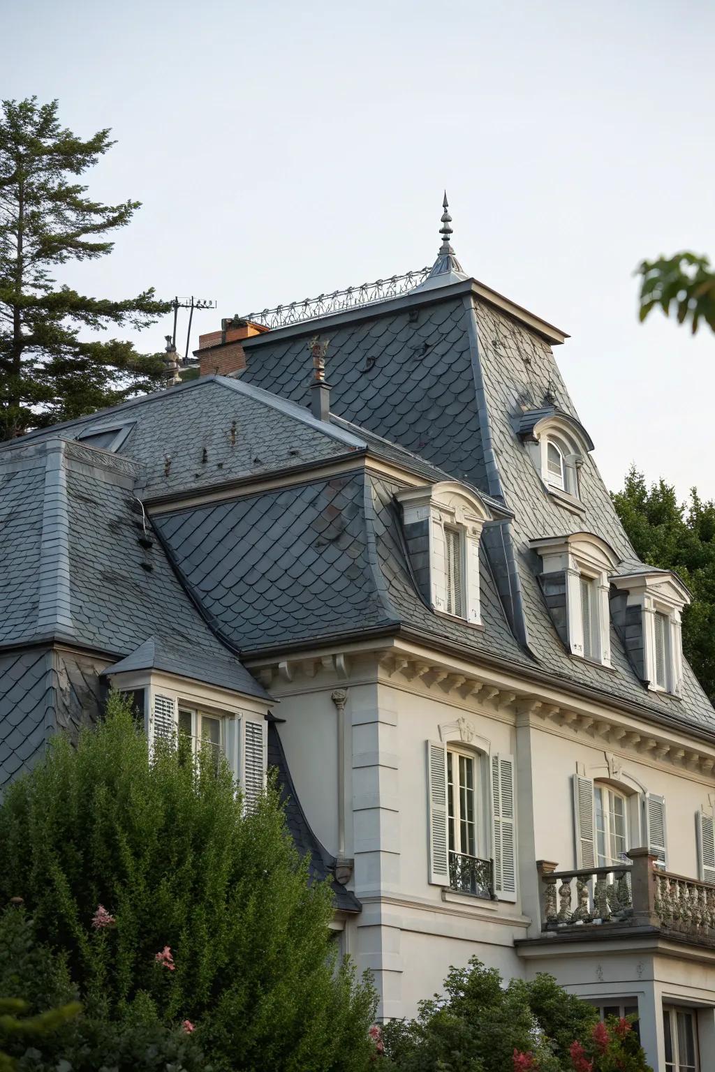 Slate tiles give this mansard roof a classic and durable finish.