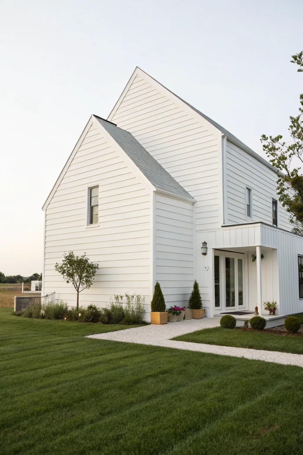 A minimalist white siding house with clean lines and a serene atmosphere.