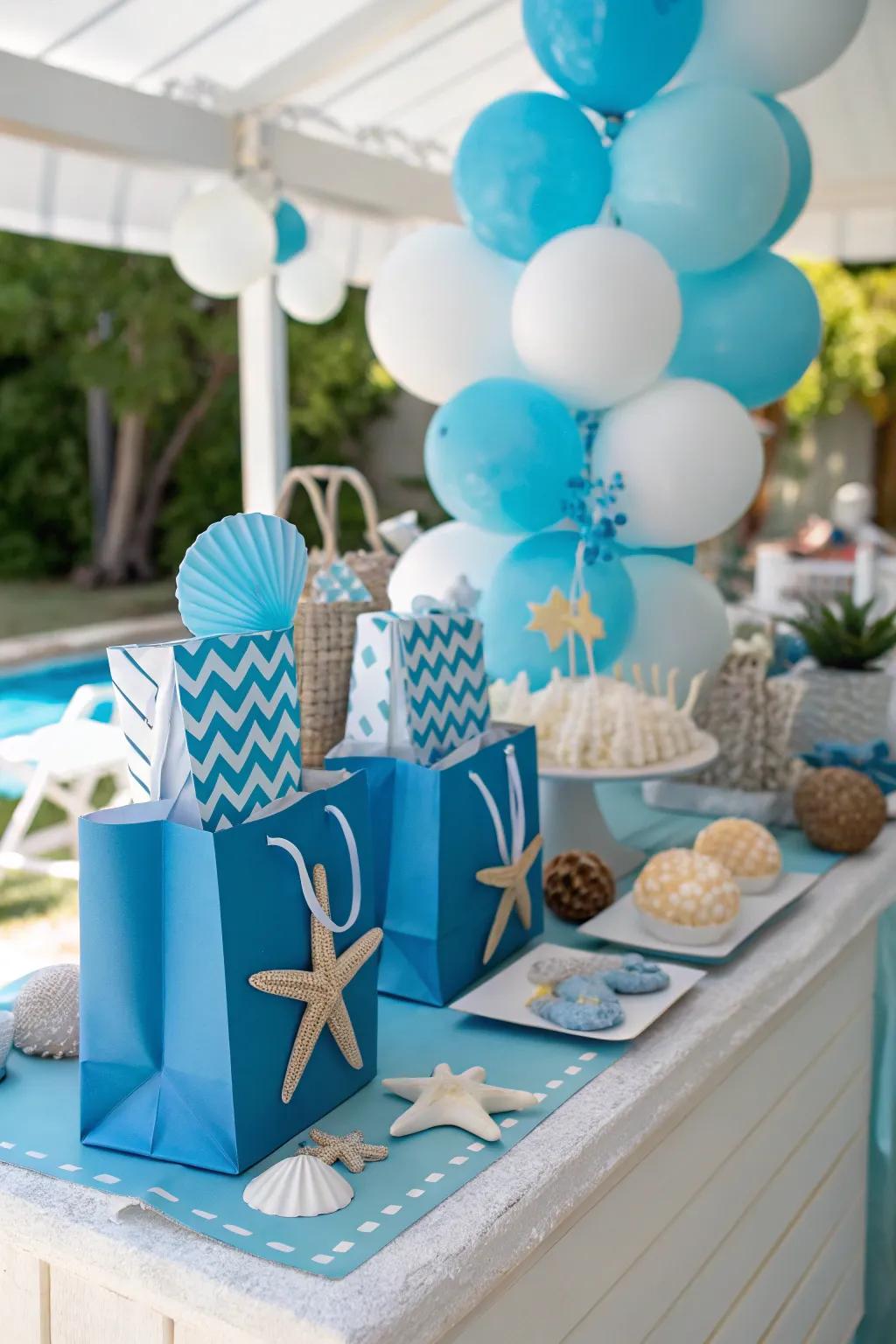 A color-coordinated party favor table exhibiting a sea-inspired theme.