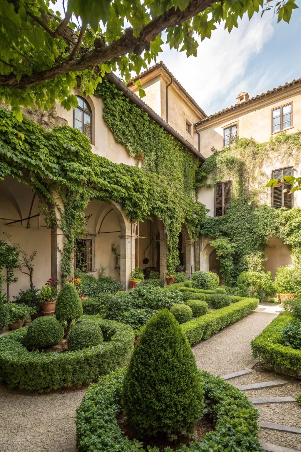 A charming Italian courtyard garden abundant with vibrant greenery.
