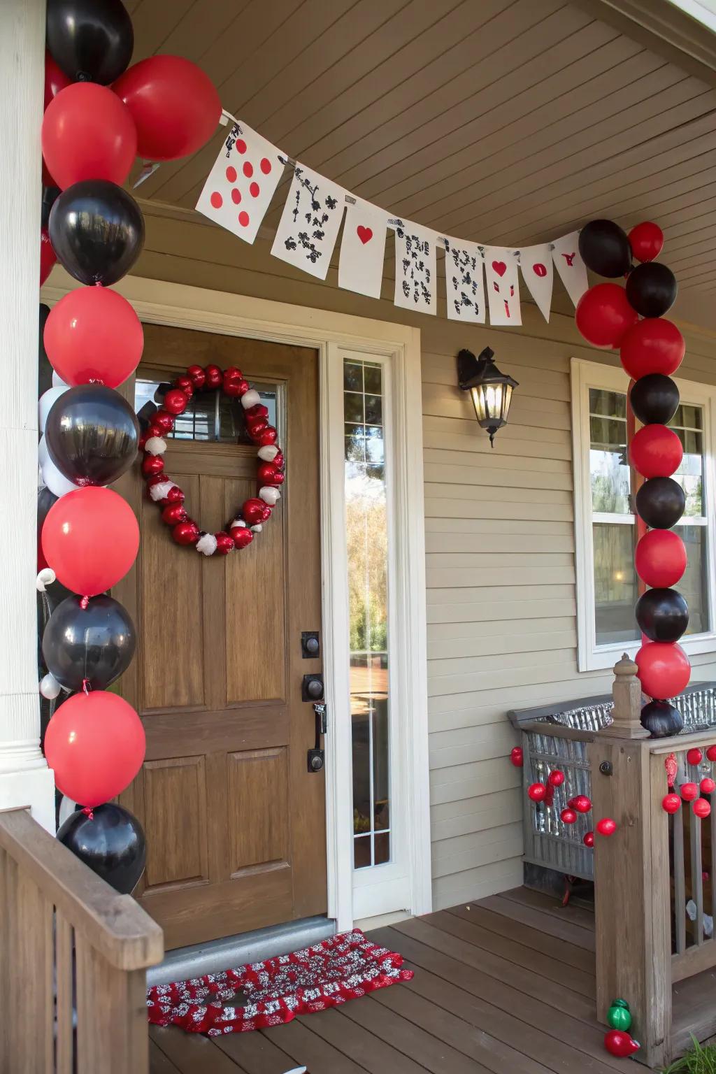 Design a remarkable entrance with balloons and playing cards to immediately set the right atmosphere.