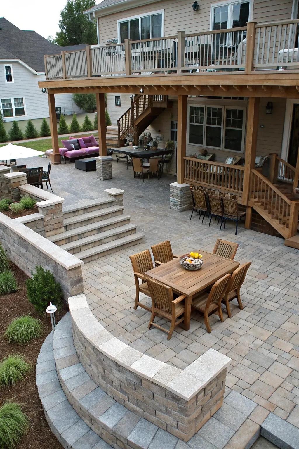 A multi-tiered patio establishes distinct zones for various activities.