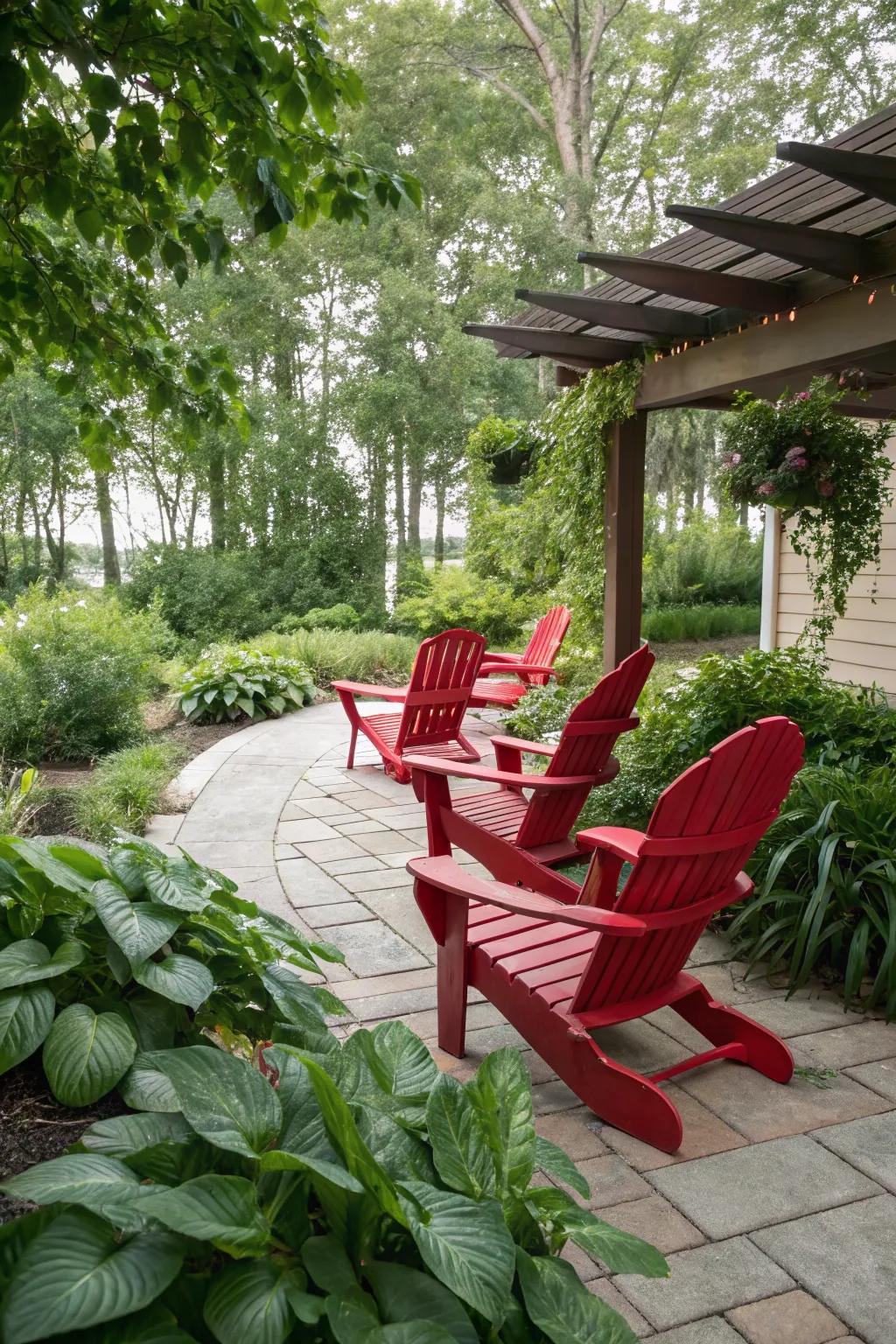 Scarlet Adirondack chairs stand out beautifully amidst lush greenery.