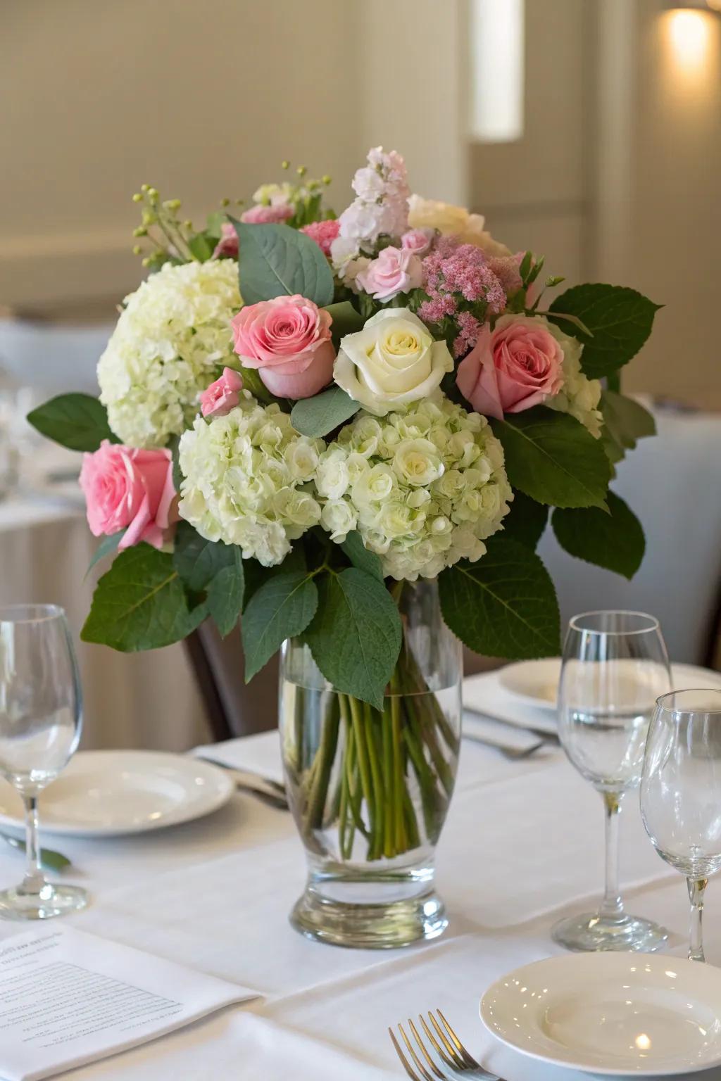 Elegant floral arrangements with roses and hydrangeas.