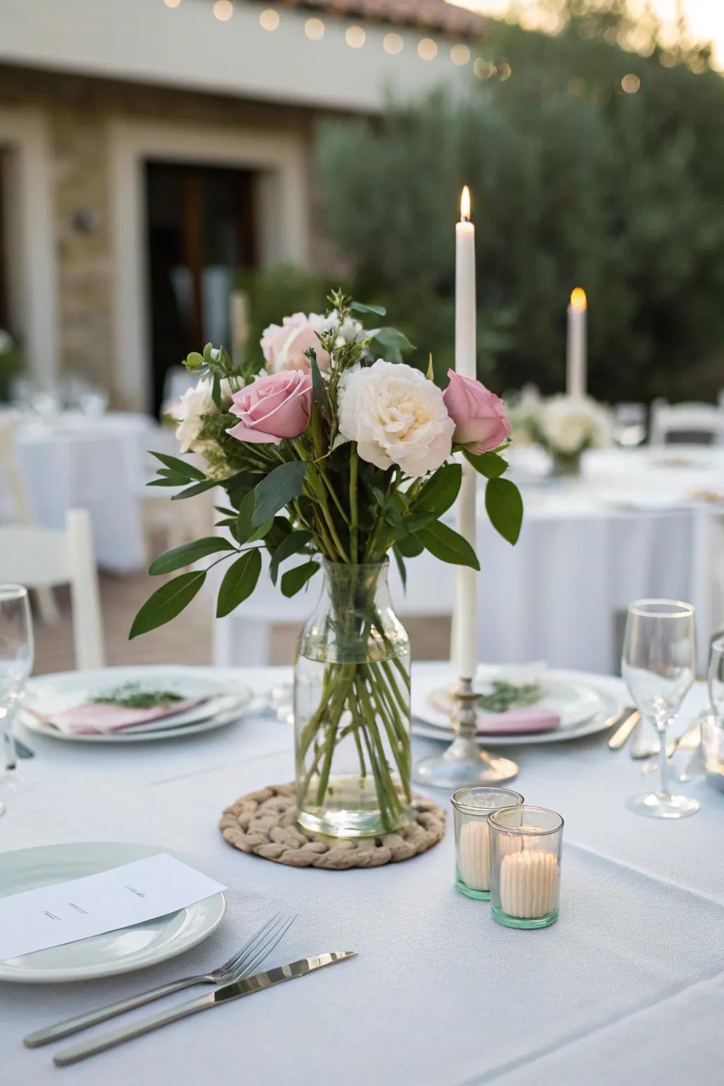 A simple vase containing peonies introduces elegance to the table layout.