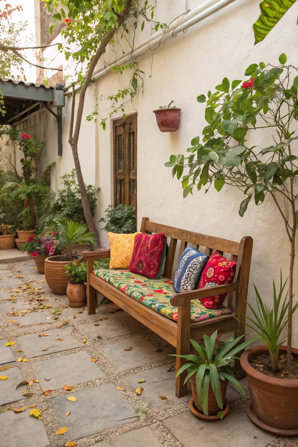 A refurbished bench with colorful cushions creates a welcoming seating nook.