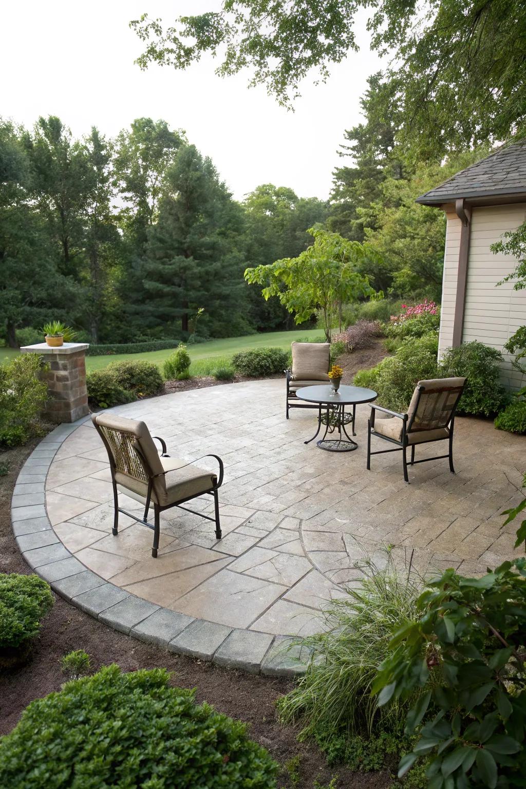 A stamped concrete patio in a circular design, creating an inviting escape.