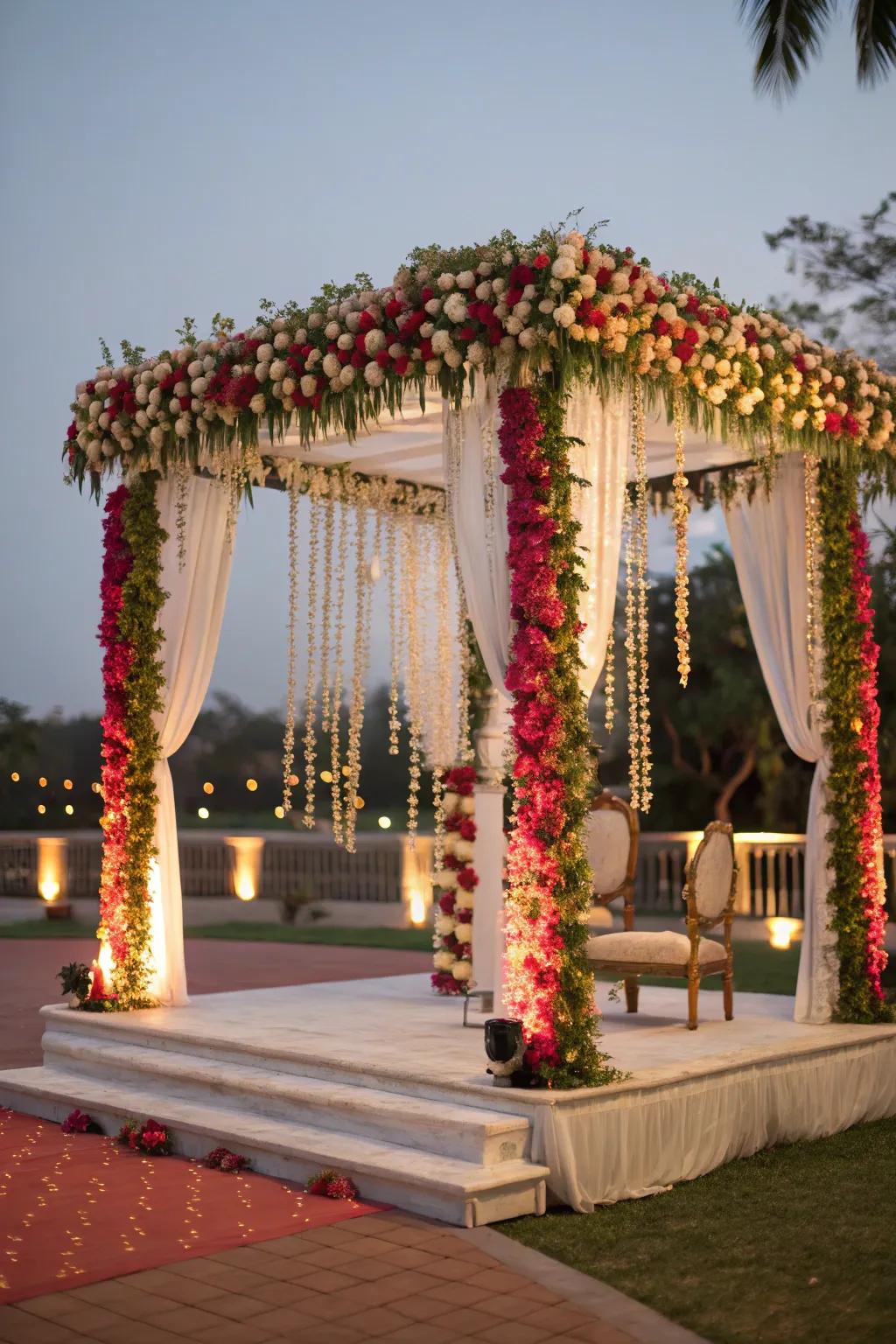 Hanging floral garlands adding layers of beauty to the mandap.