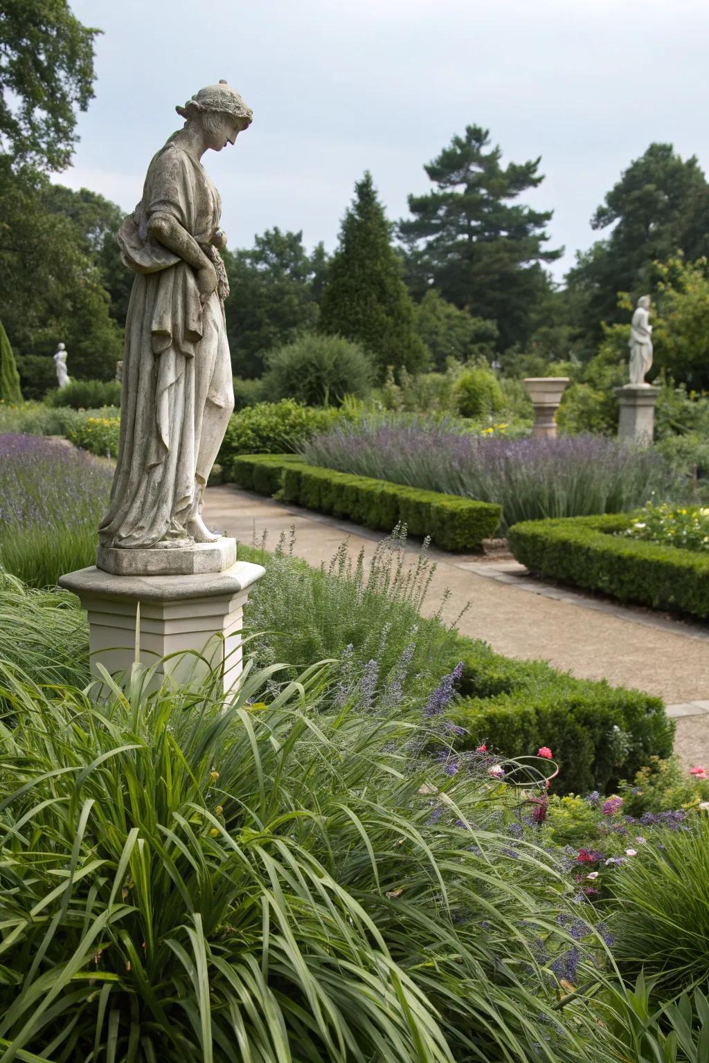 A garden statue elegantly accented by the lush Whispering Grass encircling it.