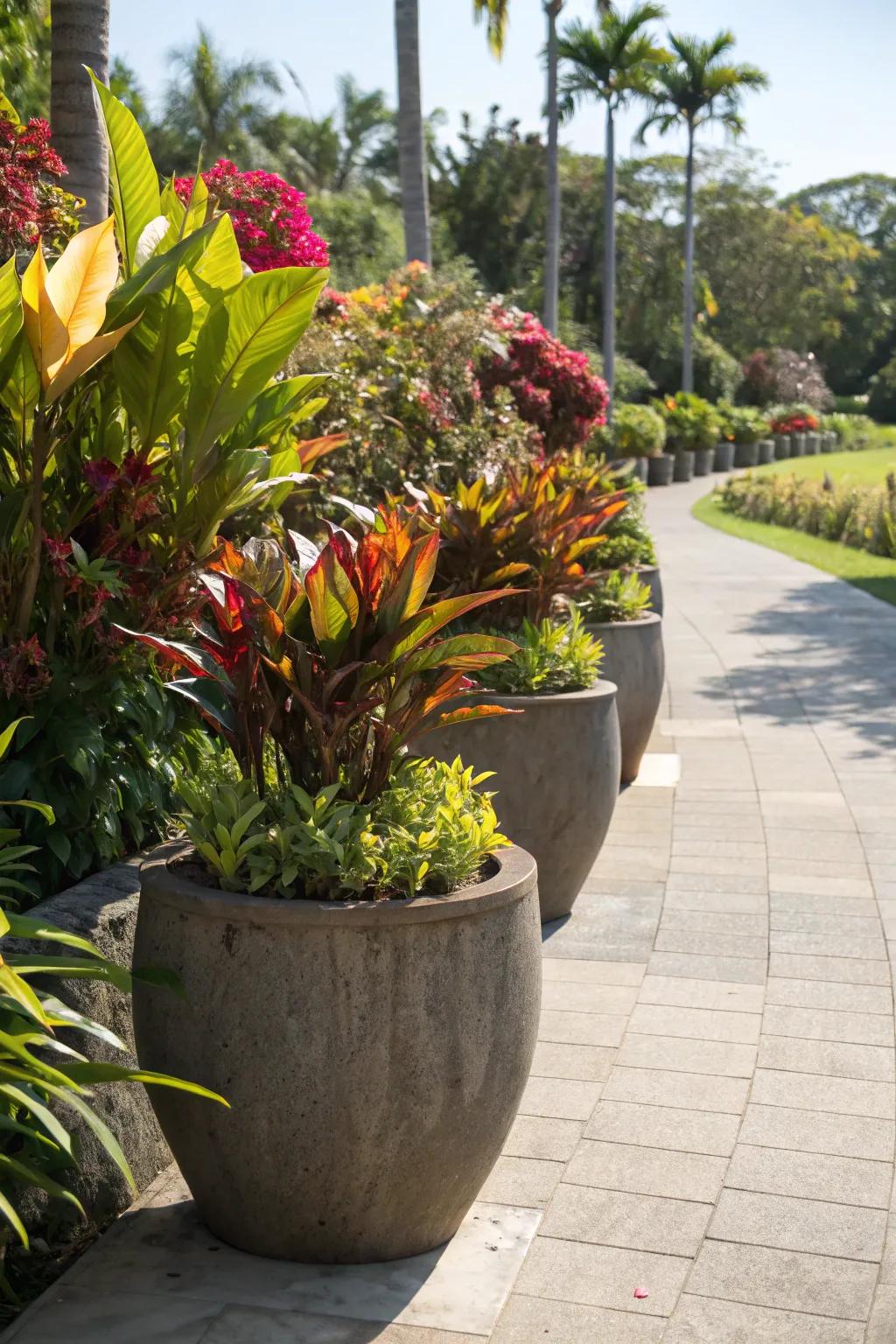 Enormous receptacles overflowing with lush tropic flora.