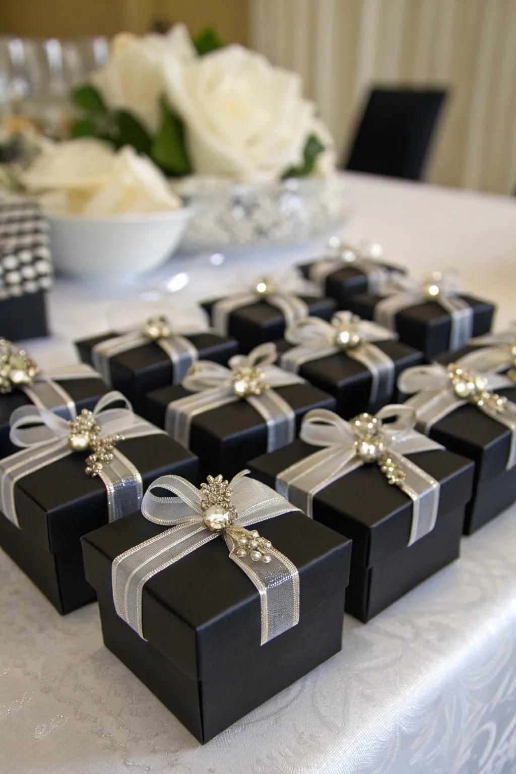 Sophisticated wedding favor boxes in coal and shimmer.