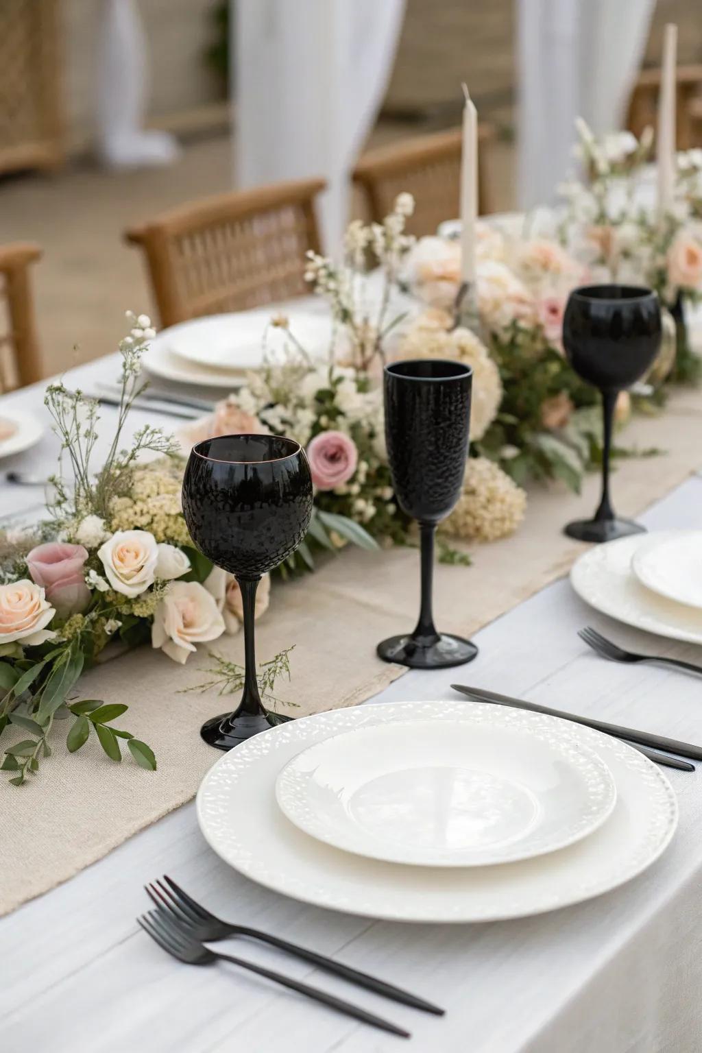 Ebony glassware introduces a sophisticated touch to the wedding tablescape.