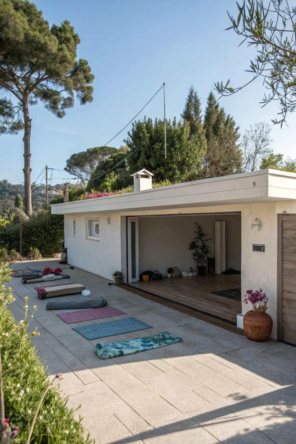 A rooftop yoga space on a flat roof garage offers a quiet retreat.