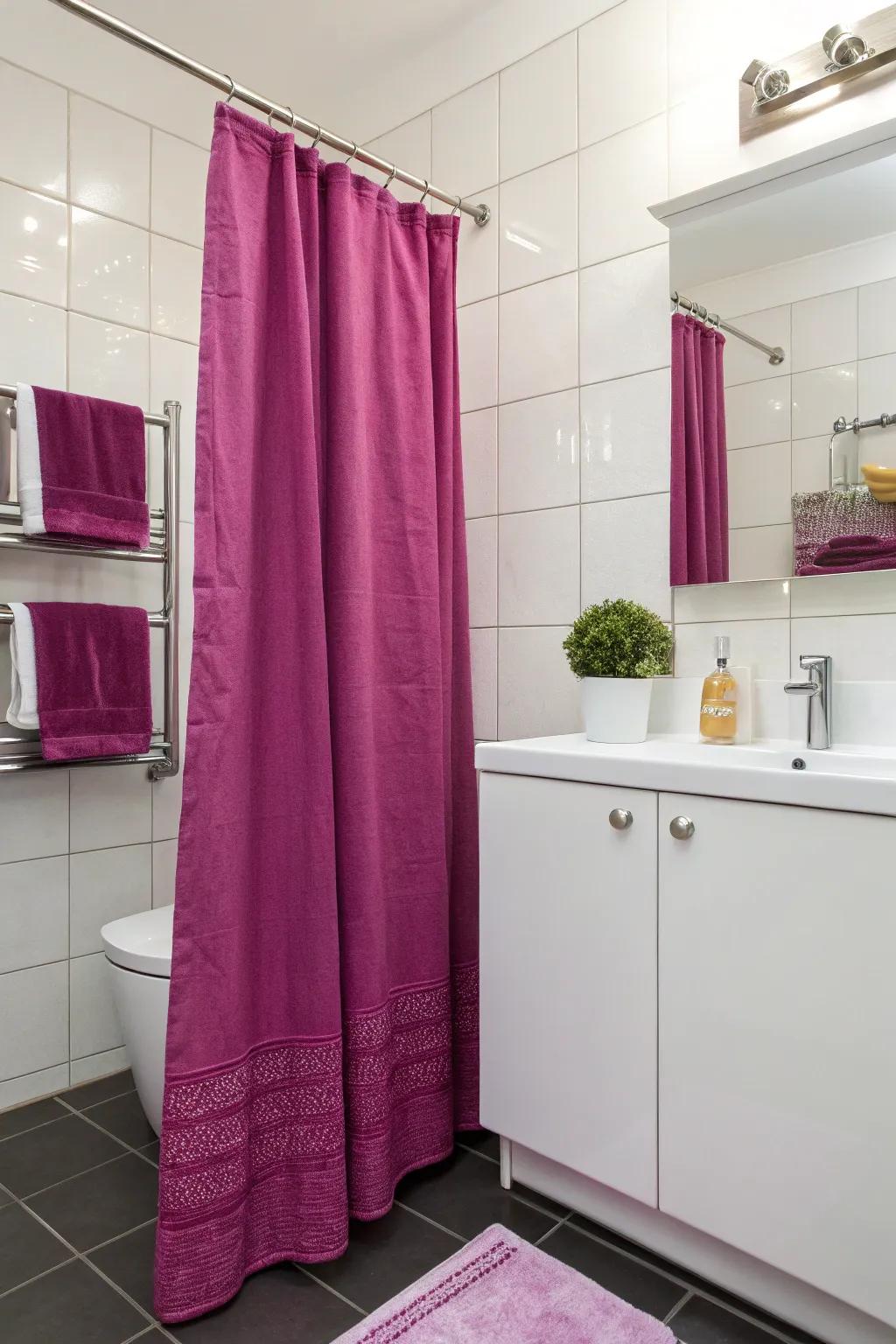 Magenta accents bring a lively touch to this modern bathroom.