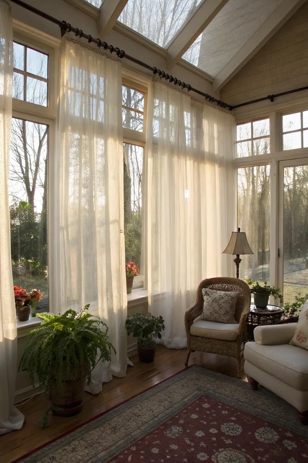 Light-filtering curtains enhance the natural glow in this inviting sunroom.