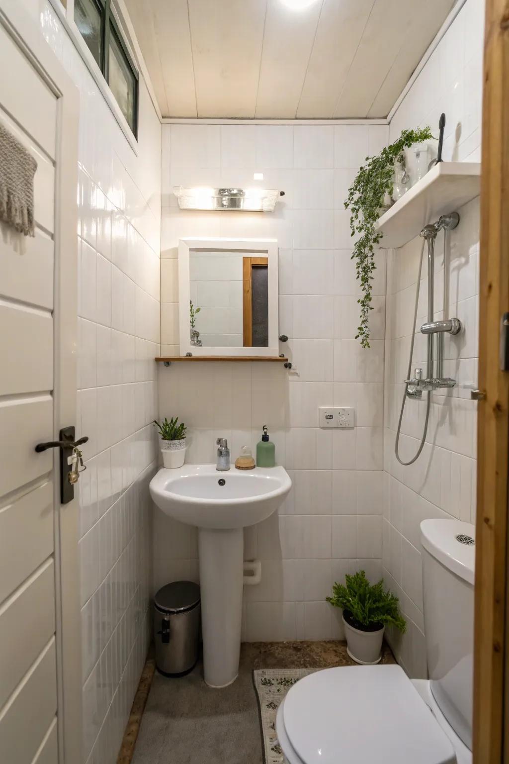 White boards establishing a minimalist and peaceful ambiance in a small bathroom.