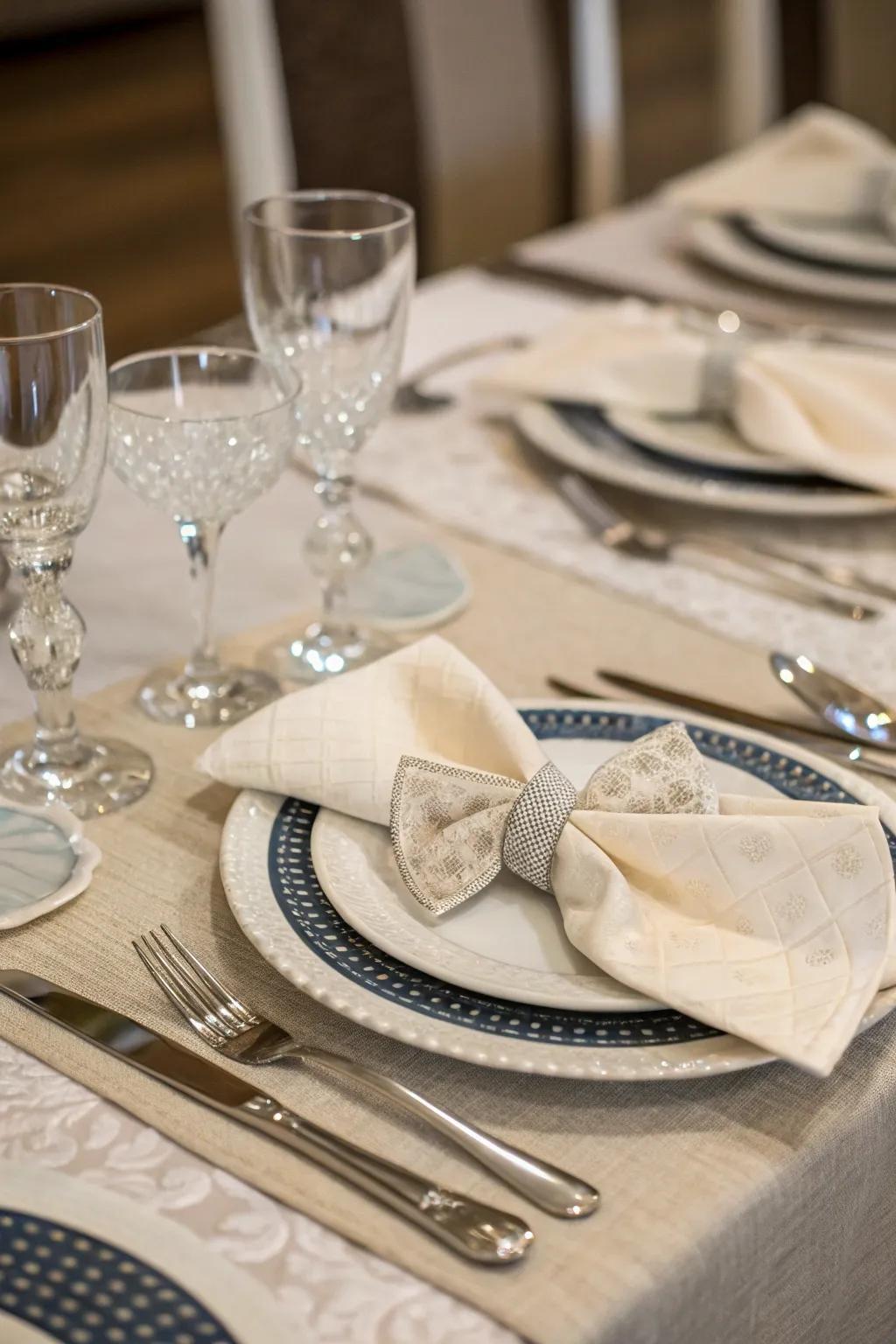 Sophisticated bow tie napkin folds for elegance.