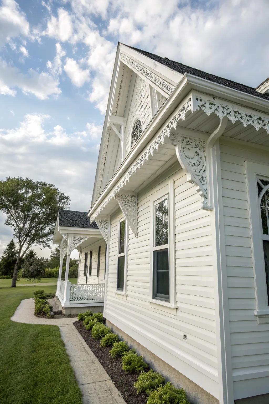 A house with white panelling and elegant detailed trim.