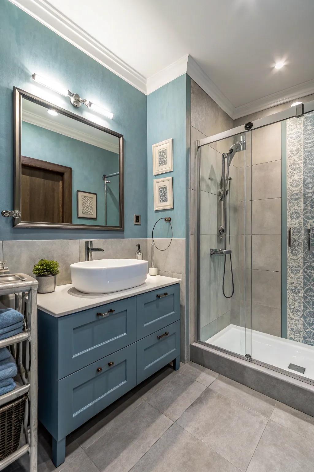 Blue and gray unite in a modern and harmonious bathroom design.