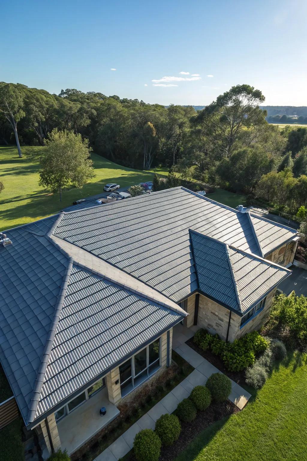An aerial view of a house features energy-efficient cool roof tiles.