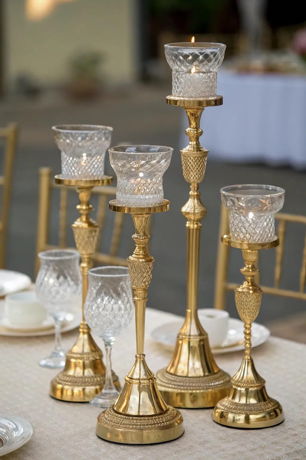 Layered refinement displaying gold and glass candle vessels.