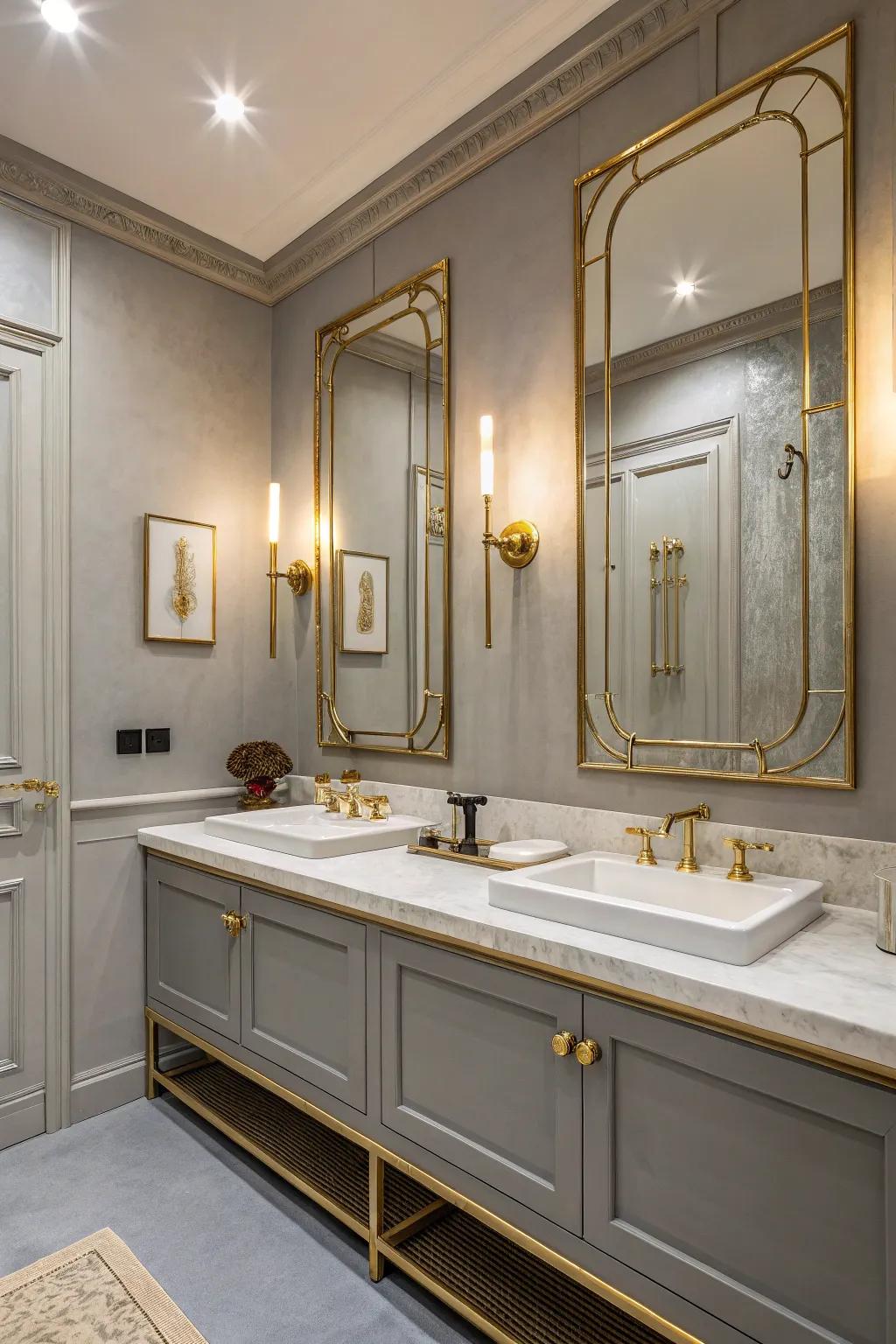 Grey walls and gold decorations create an artistic and luxurious restroom design.