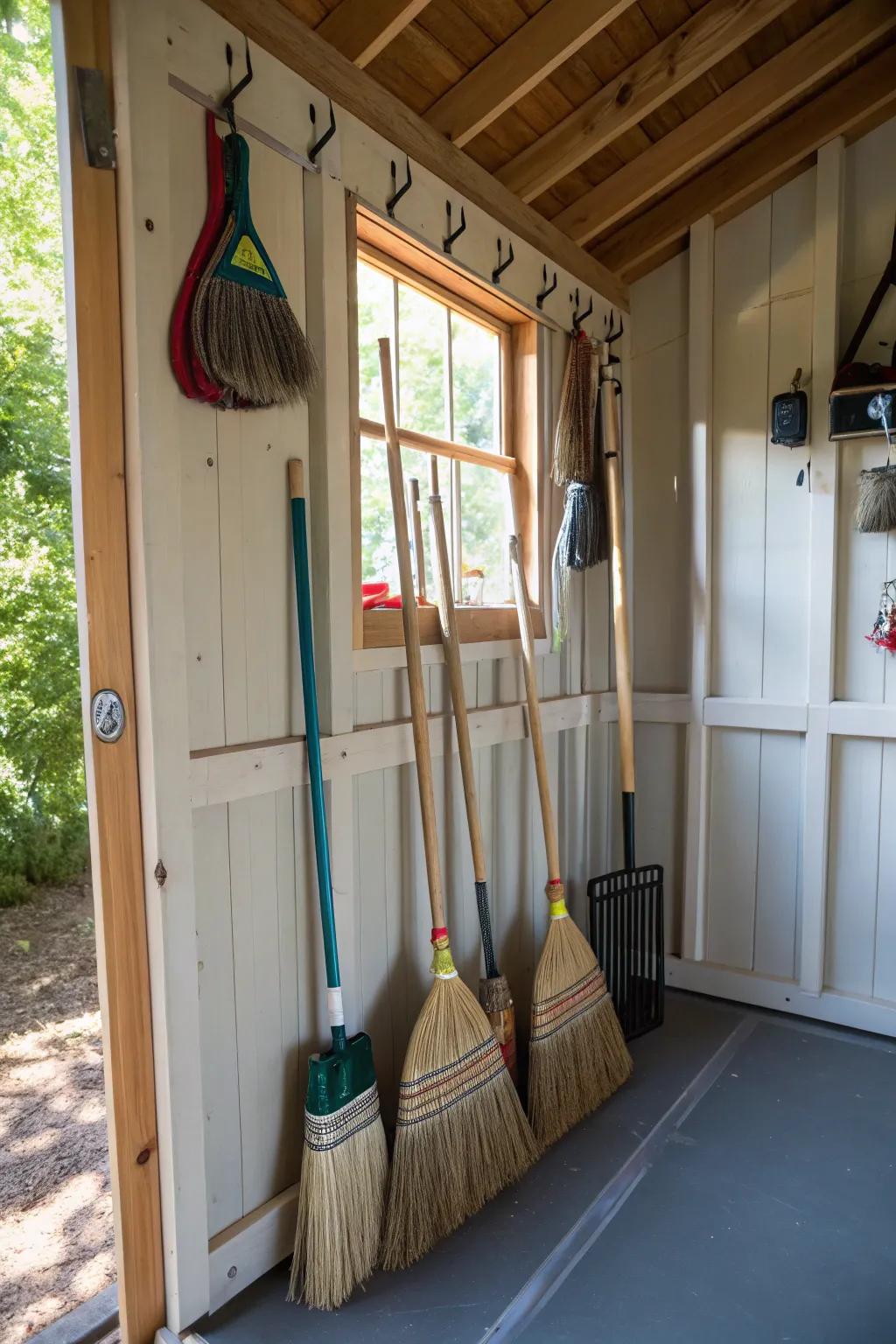 Keep floors clear with overhead broom storage.