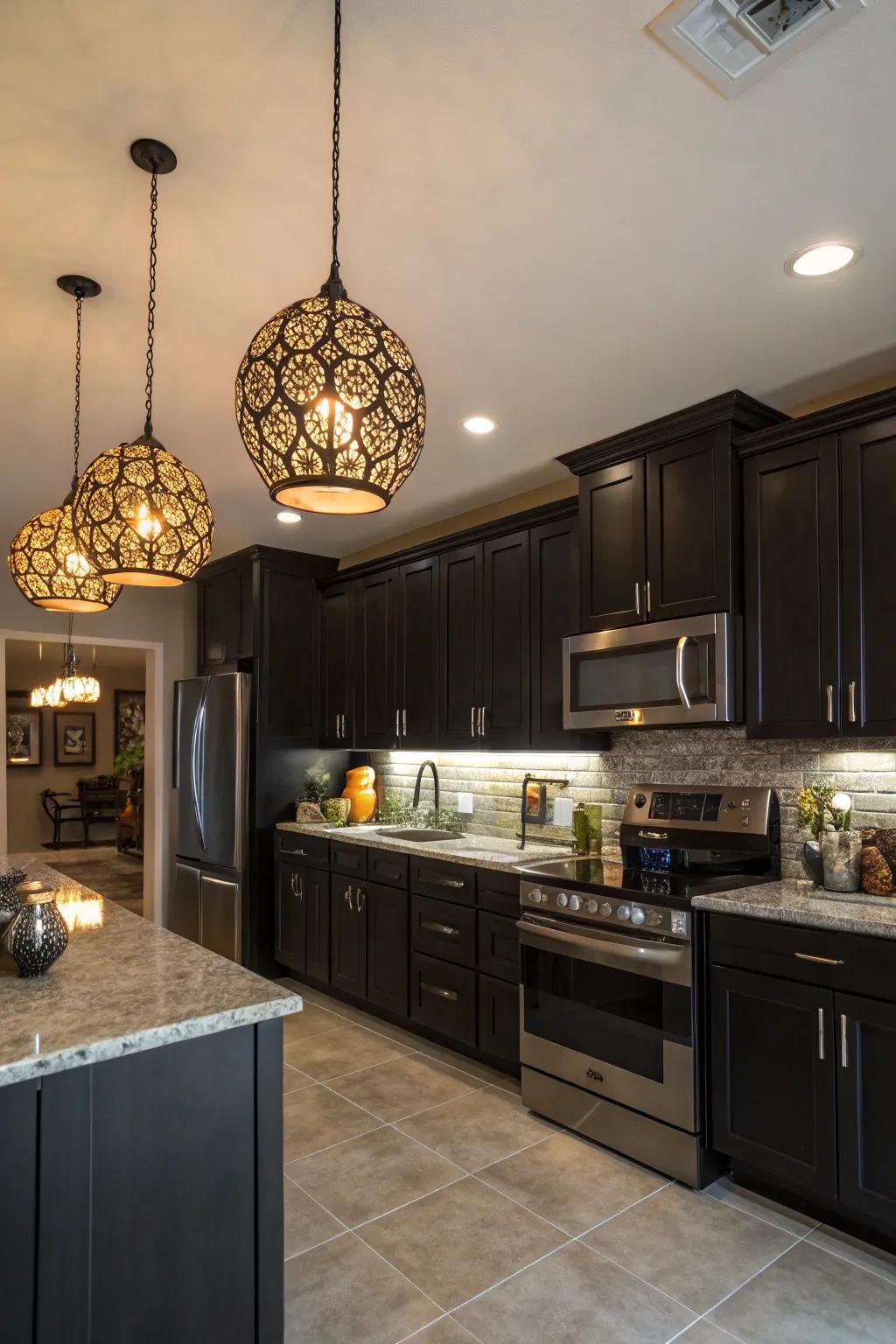 Dark cabinets brightened by artistic hanging lighting for a creative kitchen area.