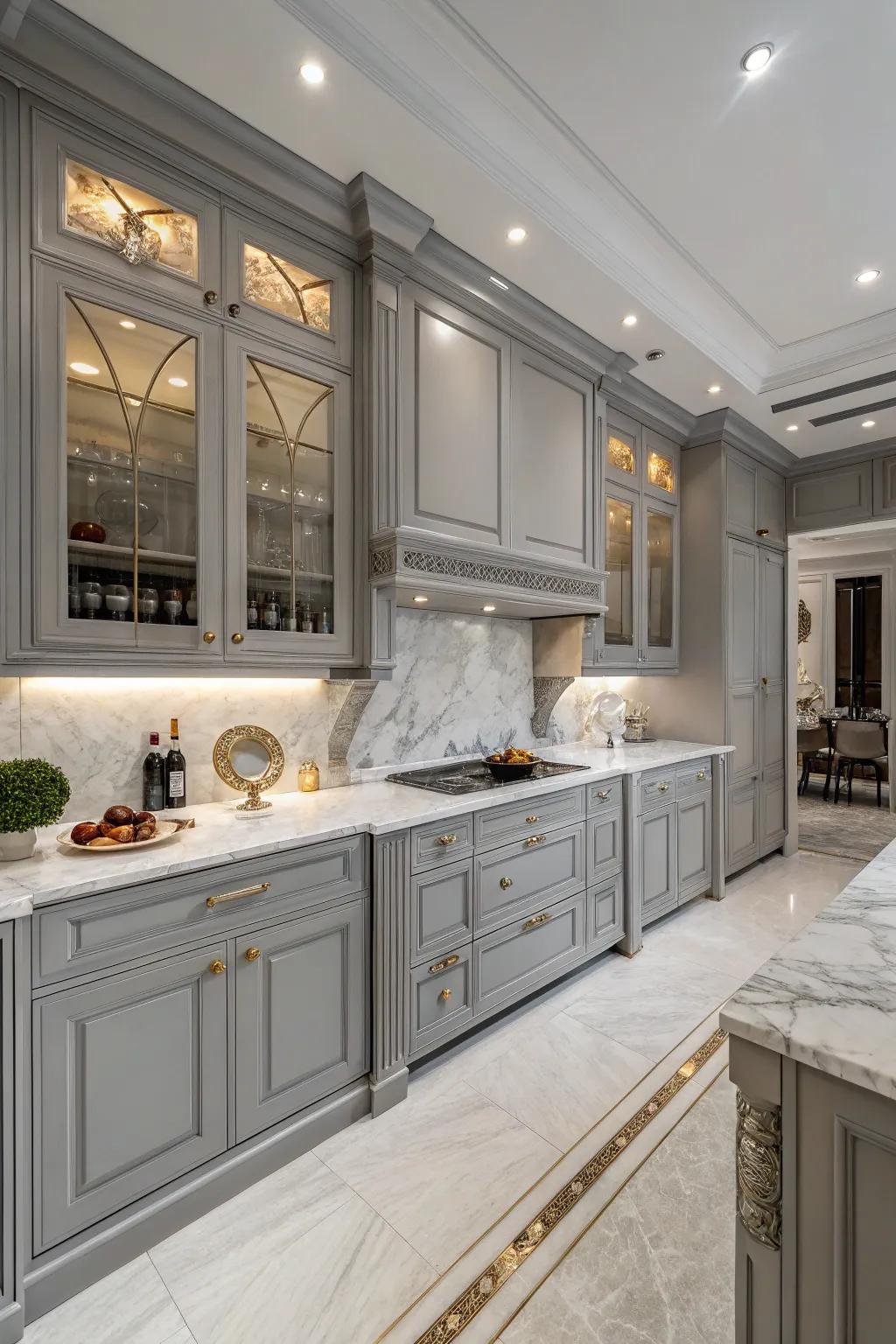 Marble countertops exuding luxury and sophistication on gray cabinets.