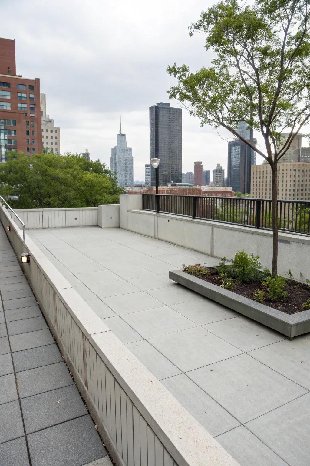 Concrete skirting provides an industrial chic style to this urban deck.