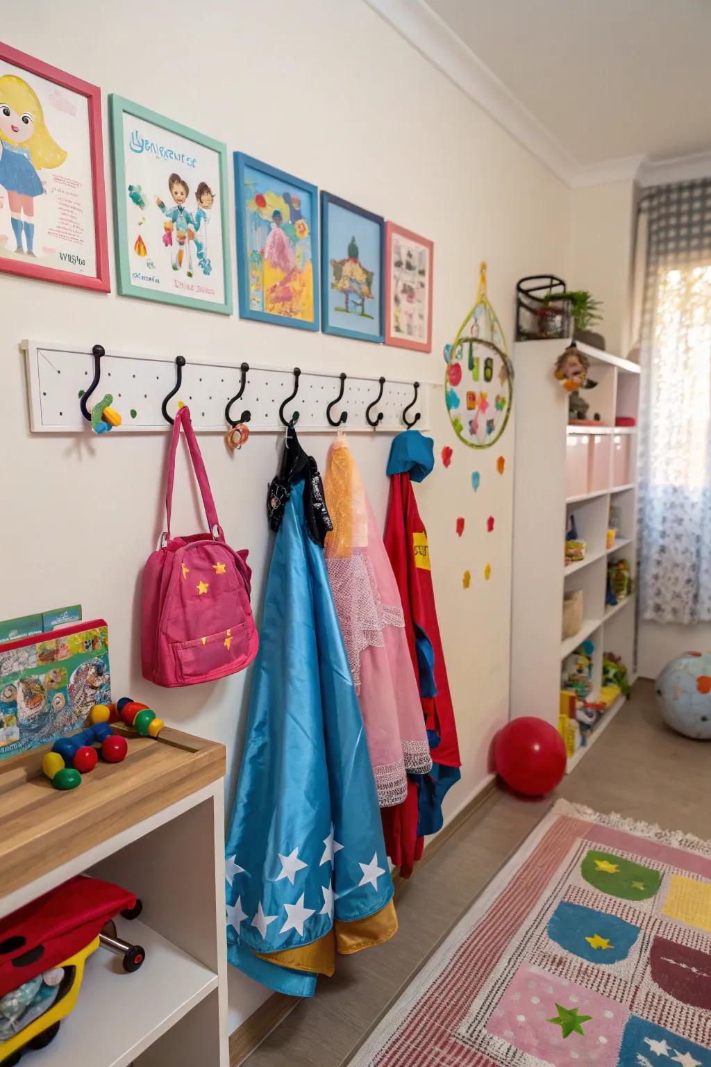 Hooks in a playroom are used to hang dress-up clothes, keeping them off the floor.
