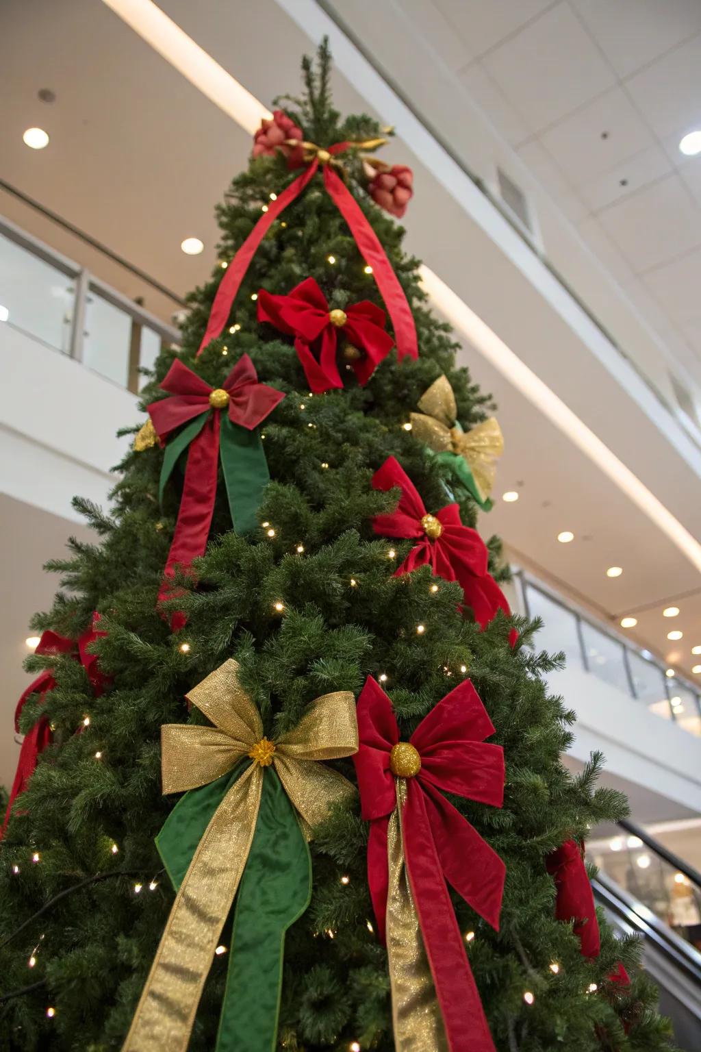 Large bows add a festive flair to this beautifully decorated tree.