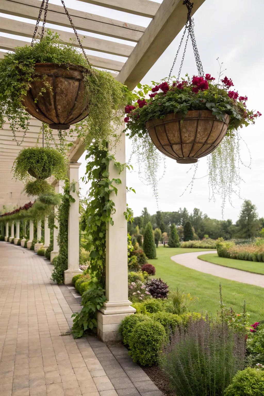 Hanging gardens bring vertical vegetation to the pergola.