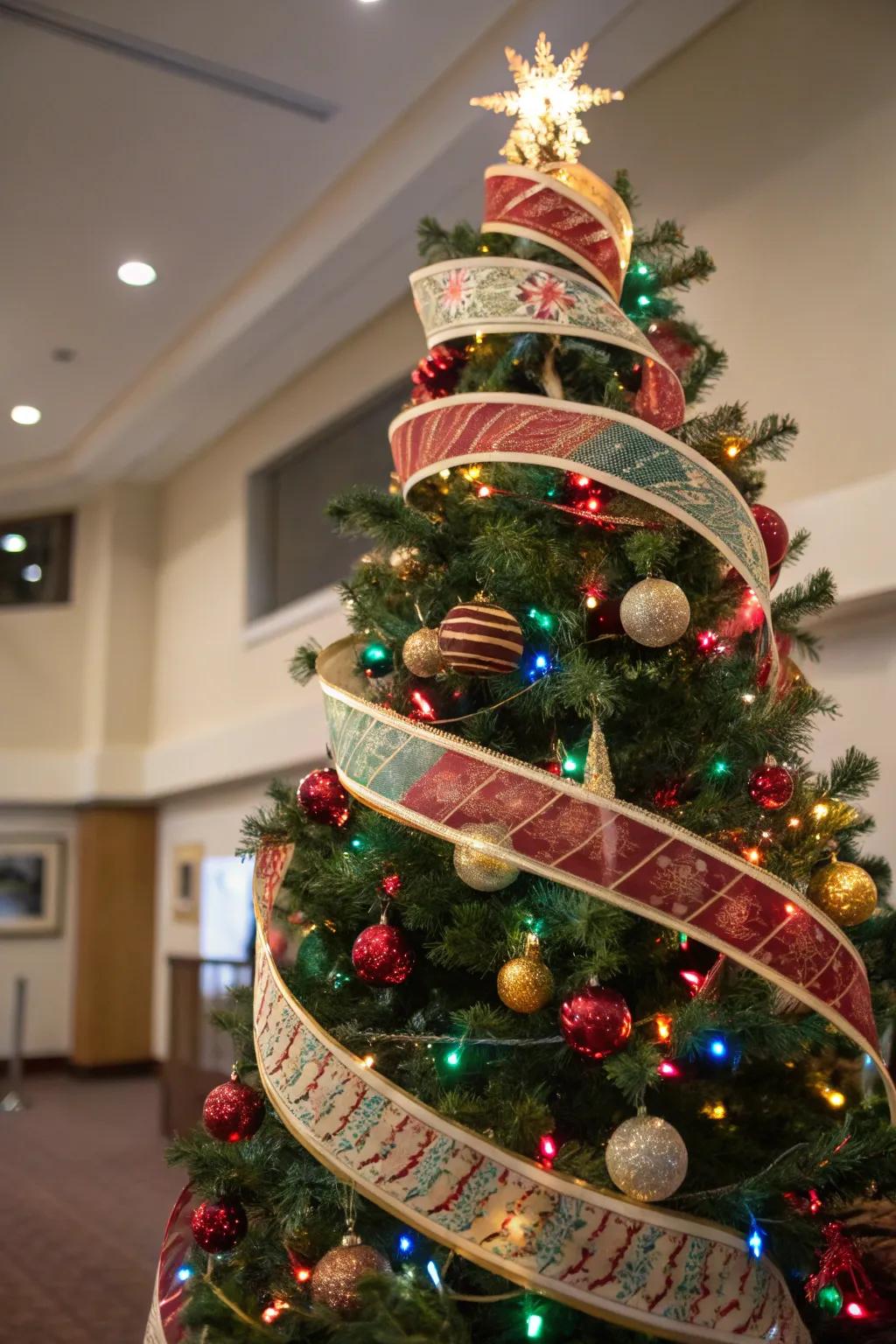 A Christmas tree showcasing spiraled ribbons, conveying dynamic motion to the festive presentation.