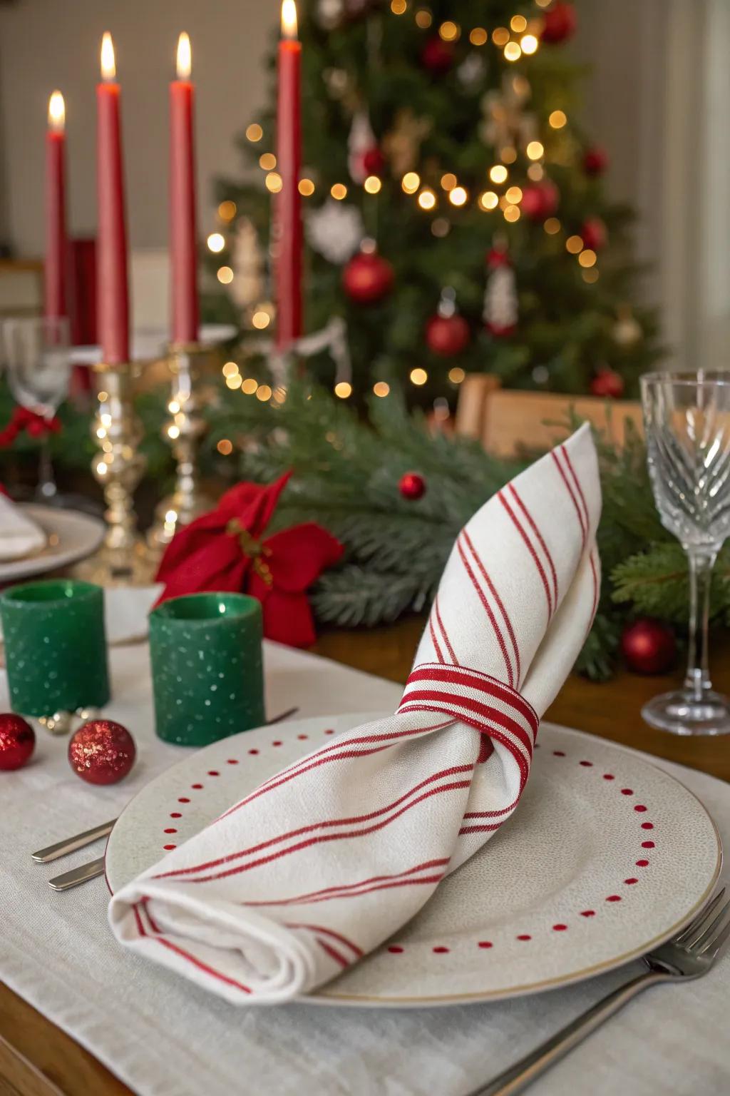 The candy cane napkin fold, adding a sweet touch to your decor.