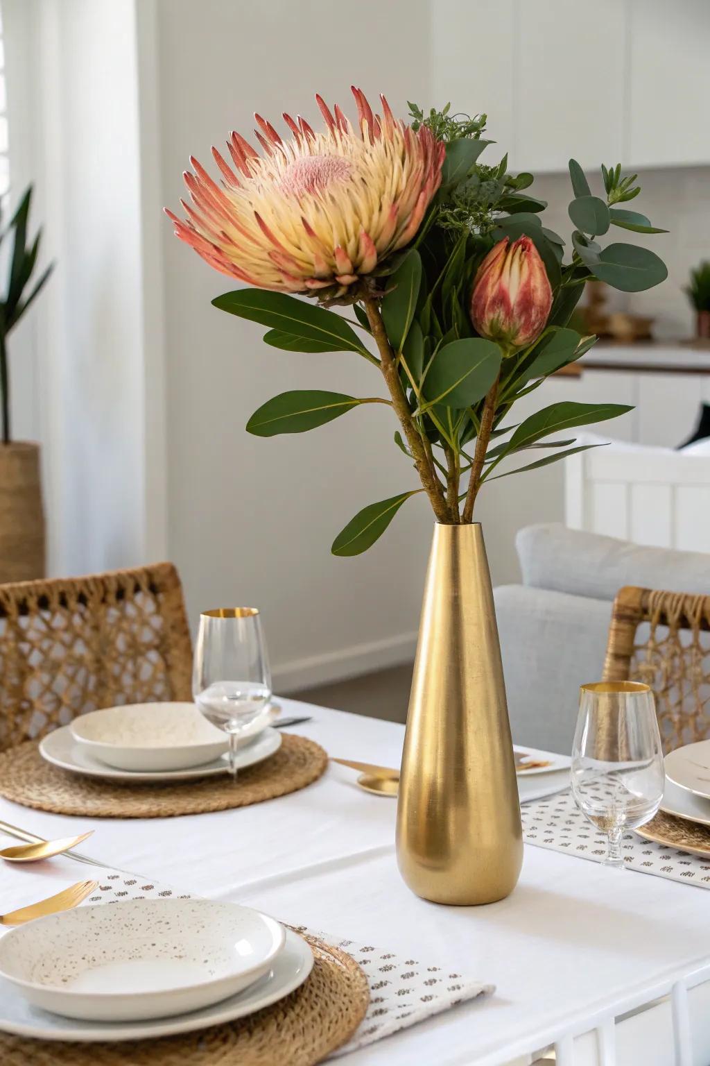 Minimalist elegance showing a singular gold vase plus bloom.
