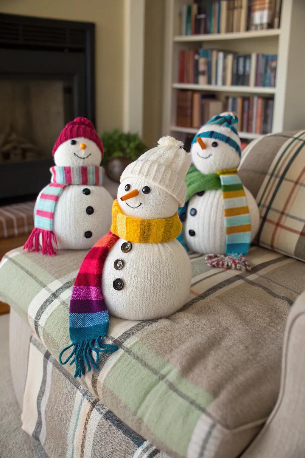 Repurposed cardigan snow figures bring warmth and imagination to your space.