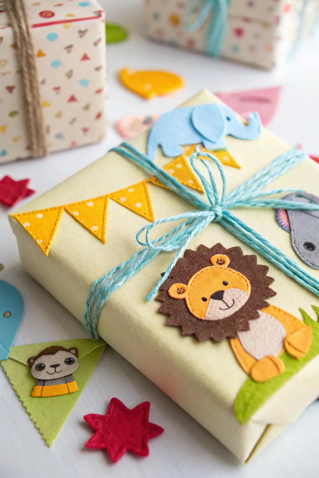 A playful gift decorated with material creature cutouts, ideal for a baby shower.
