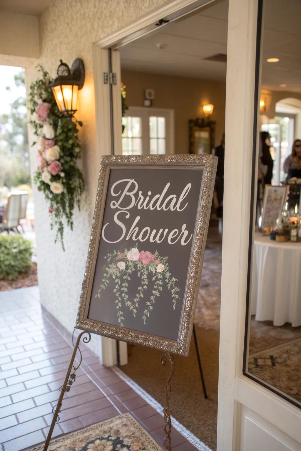 A glamorous mirror sign with calligraphy includes sophistication to the bridal shower entrance.