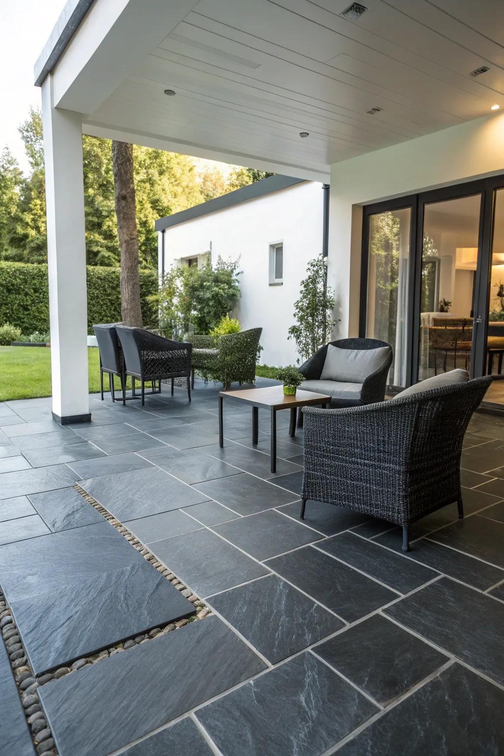 Slate tiles providing a sleek, modern patio look.