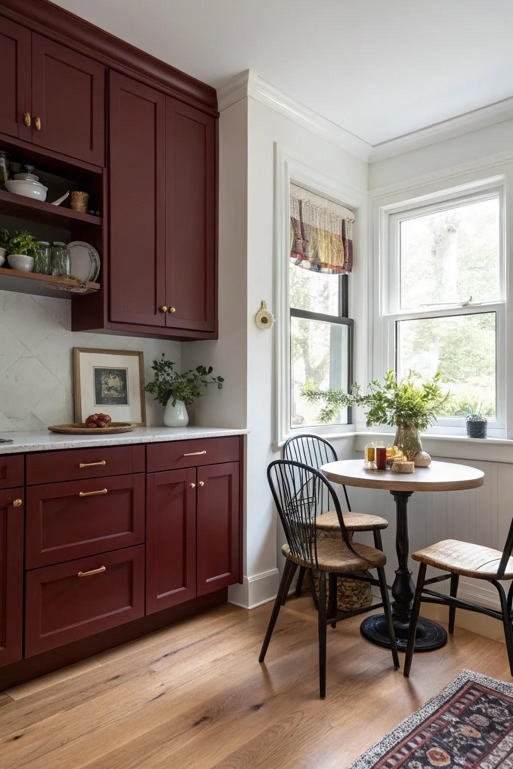 Inviting kitchen nook featuring dark red cabinetry.